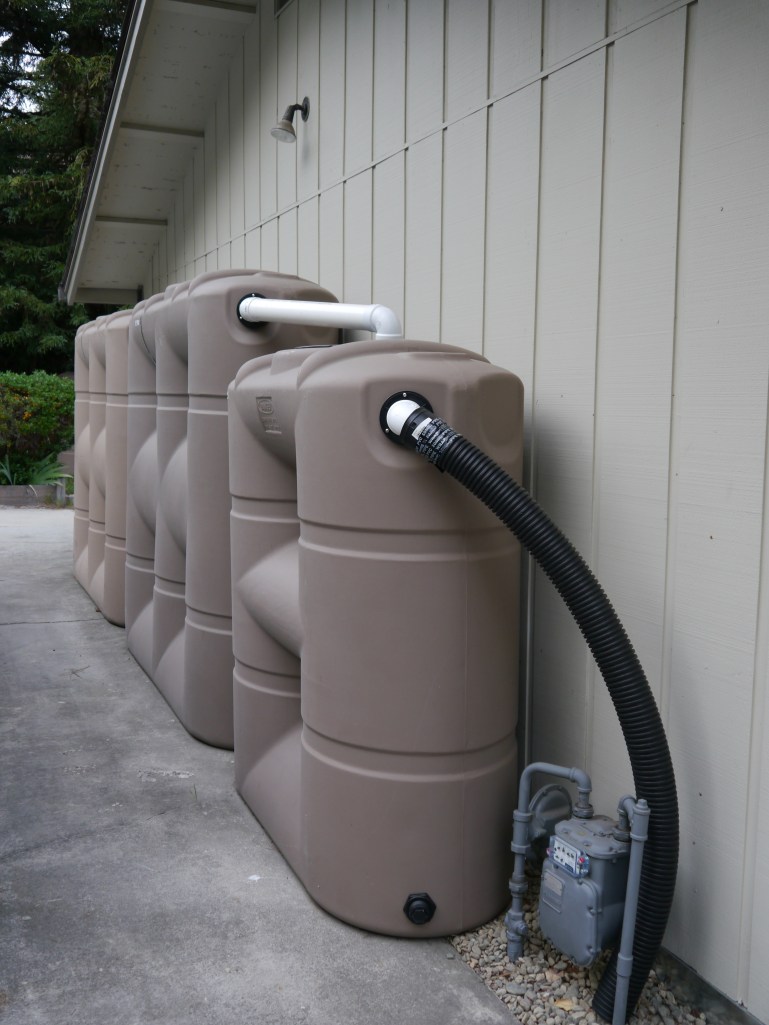 Three of our large, slimline tanks.  The fit neatly under the eve of our garage roof.