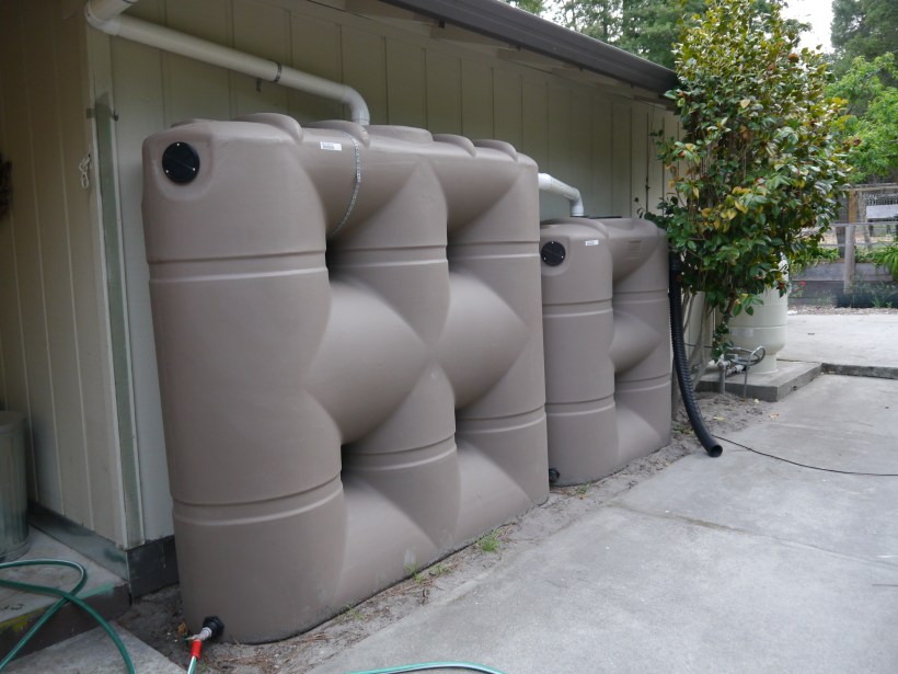 Two more of the large, slimline tanks. These are under the back eave of our garage.
